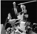 Photo of Nina Strömgren Allen and Robert Day Allen in their laboratory at Dartmouth College.