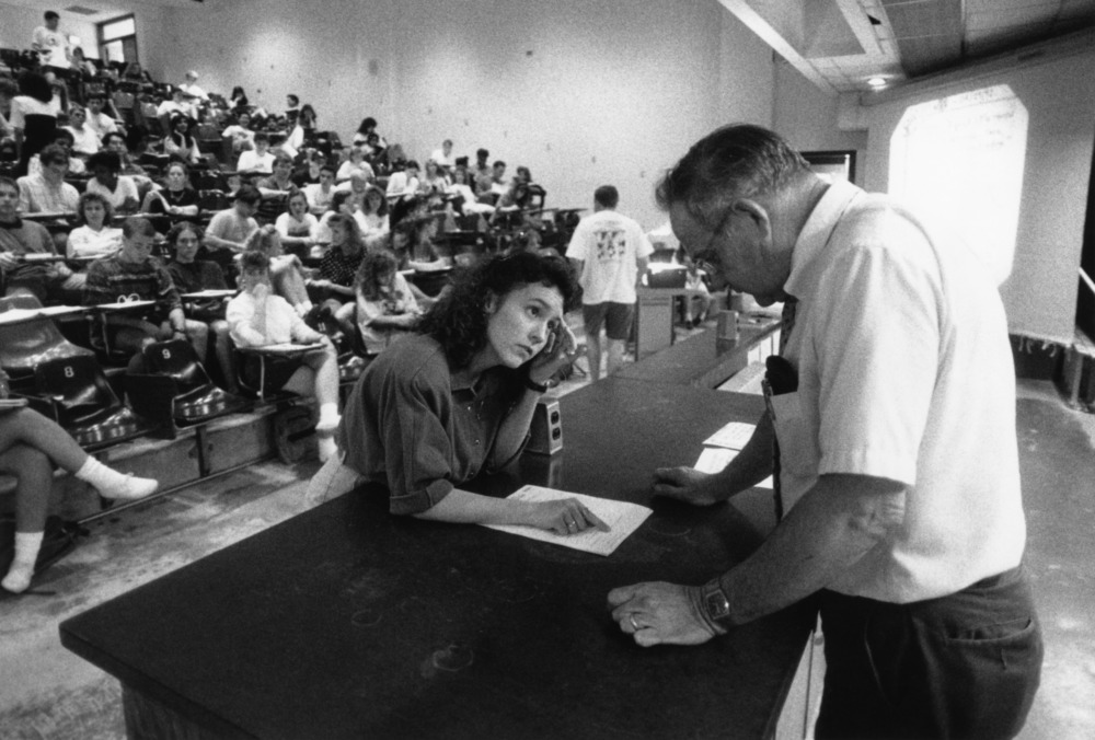 NC State student asking professor a question, 1992. Bring your questions to ask Special Collections and Digital Scholarship librarians on March 4!