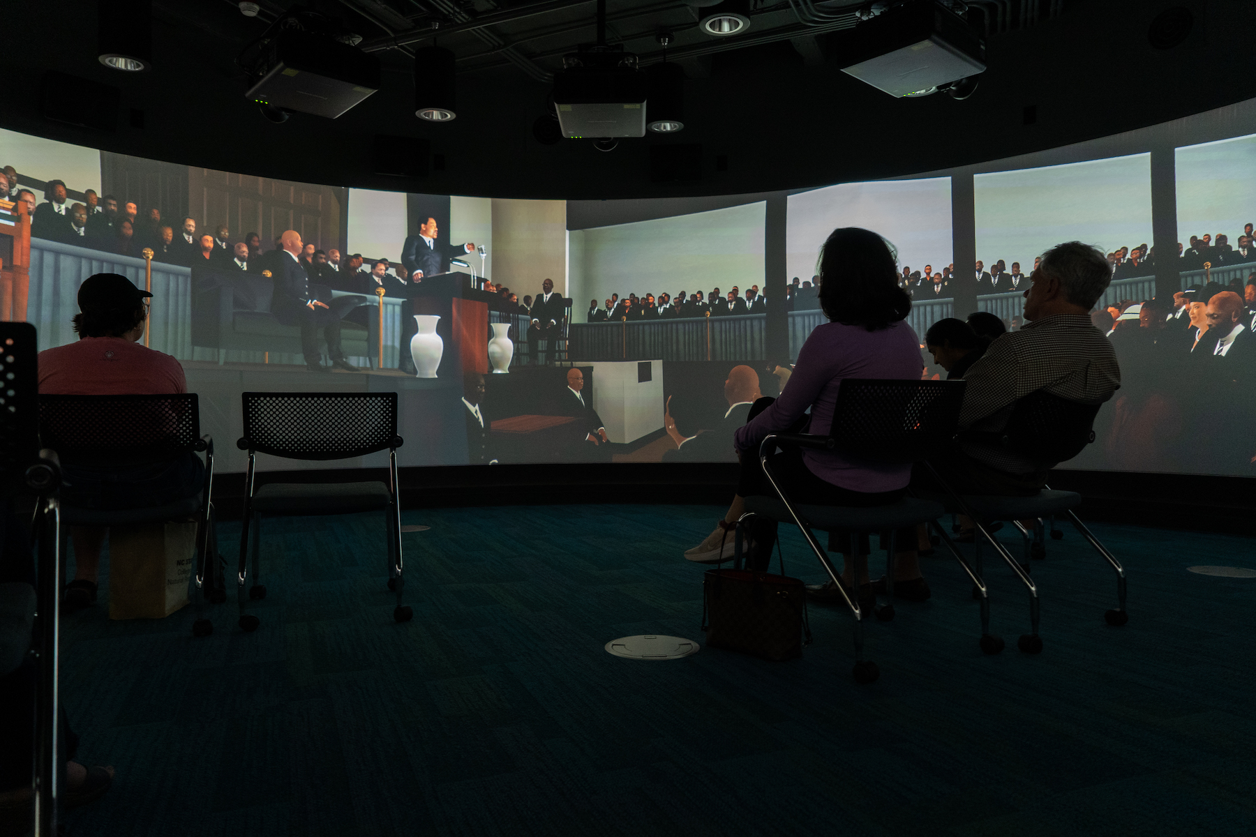 large curved screen showing a computer animated version of Dr. Martin Luther King Jr