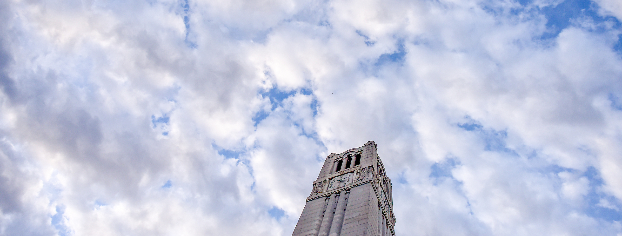 Belltower and cloudy sky