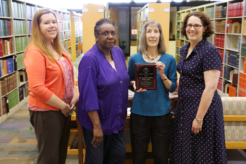 The Veterinary Medicine Library Team, left to right, Betsy Whitman, Jackie Gadison, Carol Vreeland, and Kris Alpi.