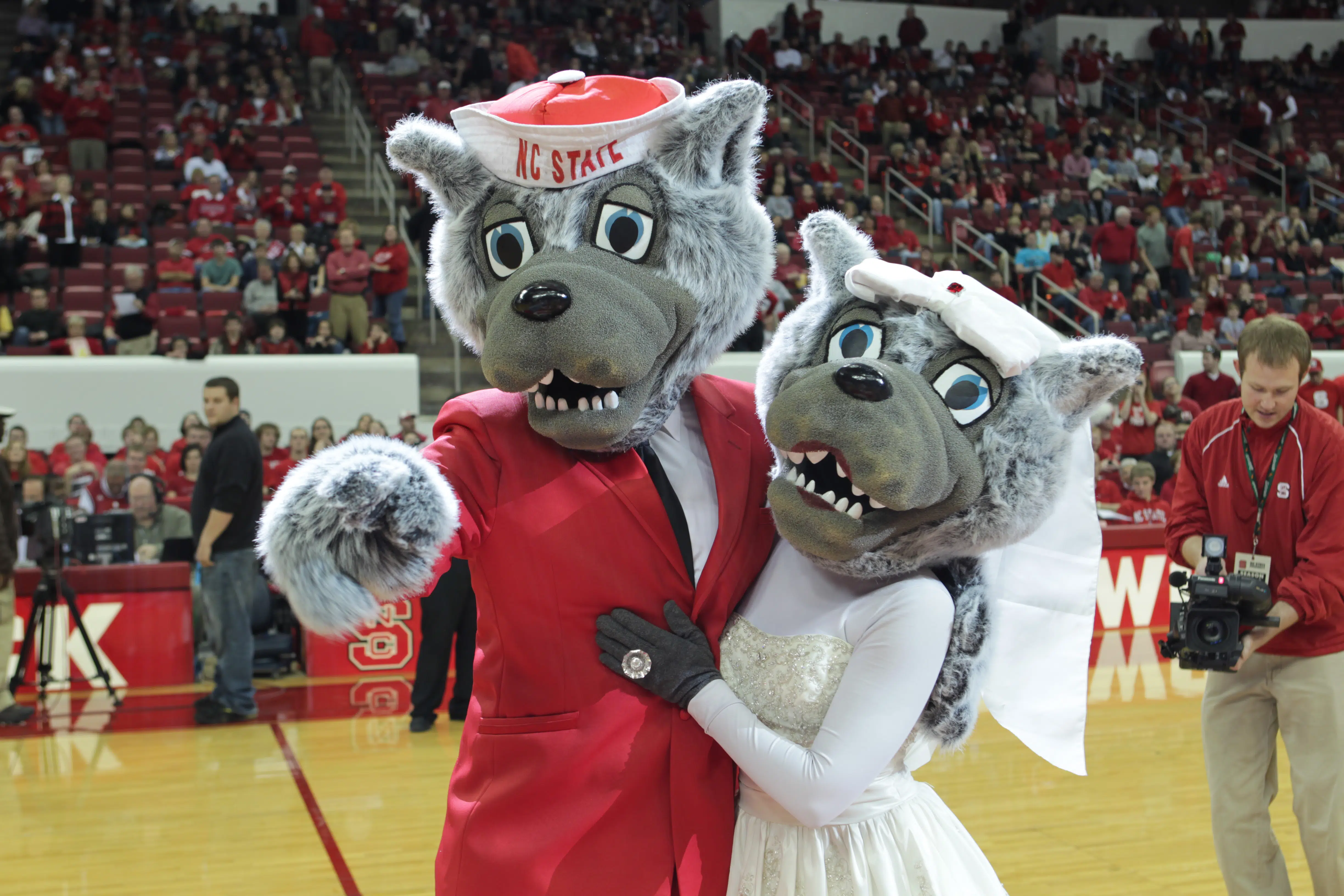 Mr. and Ms. Wuf pose together after their 2011 vow renewal ceremony, with Ms. Wuf showing off her new ring.