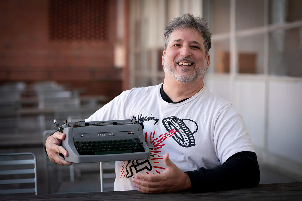 Vitiello with his typewriter. Photo by Marc Hall, NC State University Communications