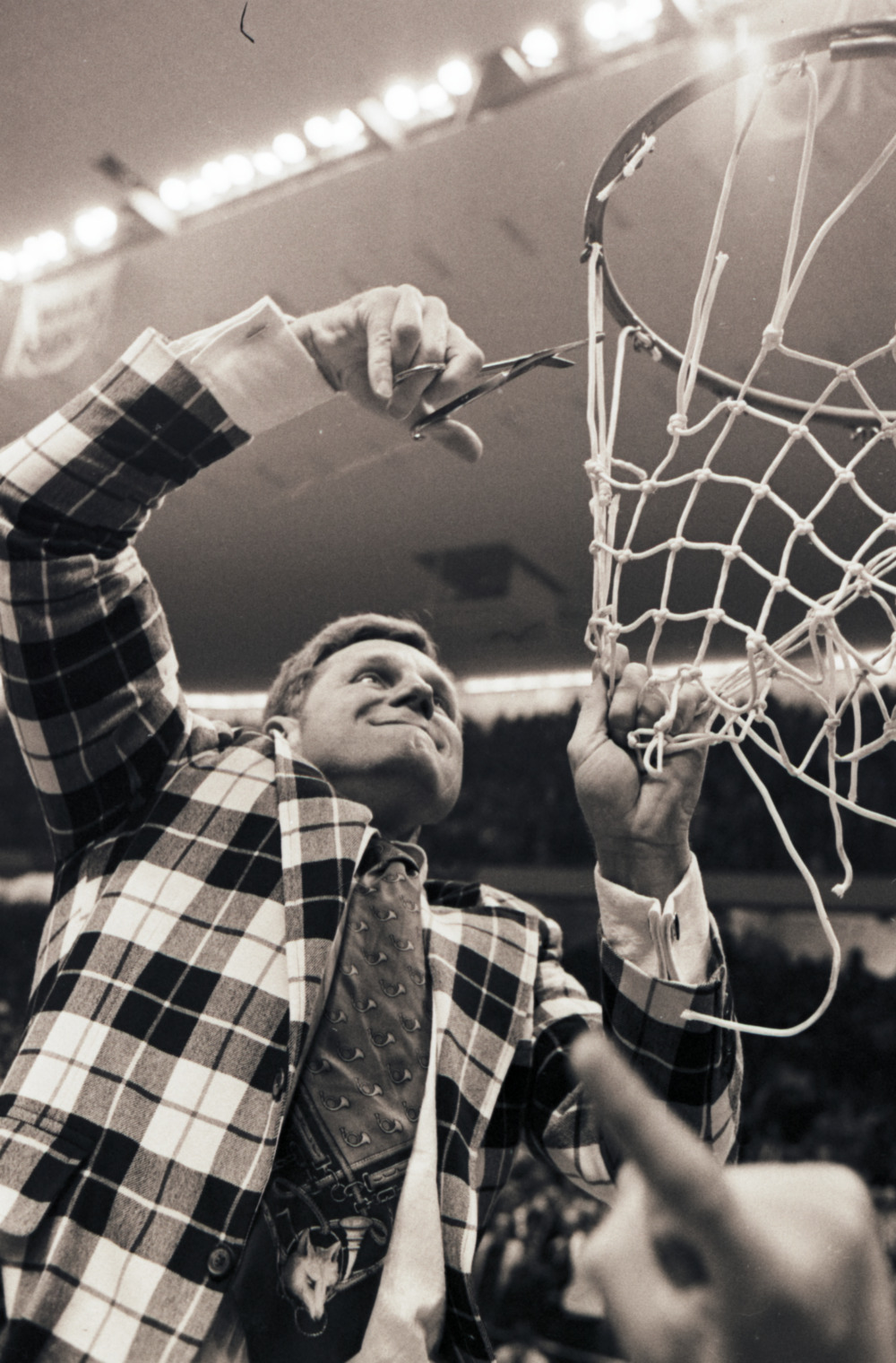Cutting down net after NCAA championship win, March 25 1974