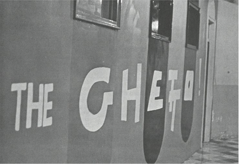 The words 'The Ghetto' printed on side of university building
