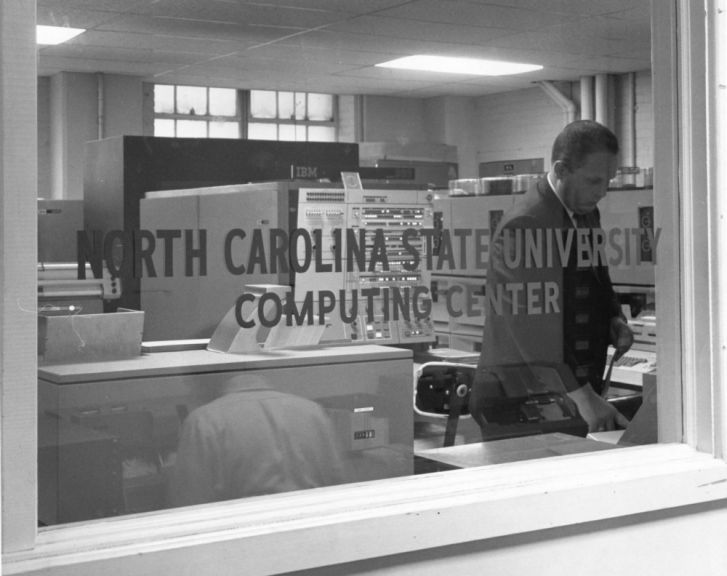 View looking through window of North Carolina State University Computing Center, circa 1970