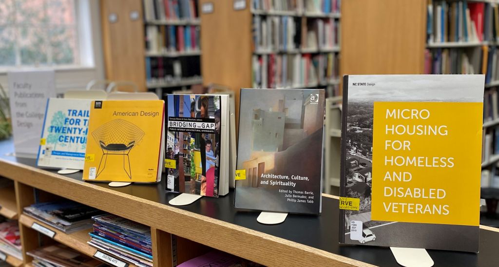 Books for this week's display of faculty publications include Architecture, Culture and Spirituality, and American Design, as well as others.