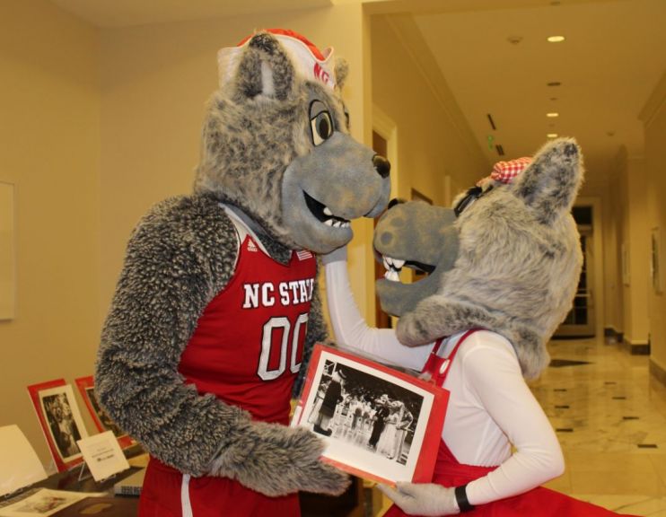 Mr. and Mrs. Wuf show off their wedding photo.
