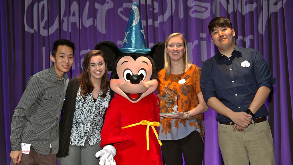 From left, Kevin Lee, Emily Wise, Mickey Mouse, Chandler Williams, and Simon Park.