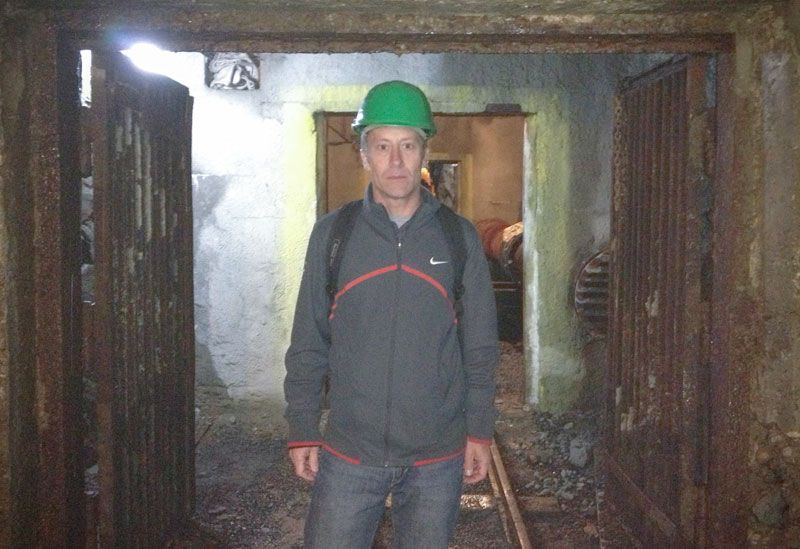 Dr. Tom Shriver wearing a helmet whilst at the Jacymov Uranium Mine in the Czech Republic