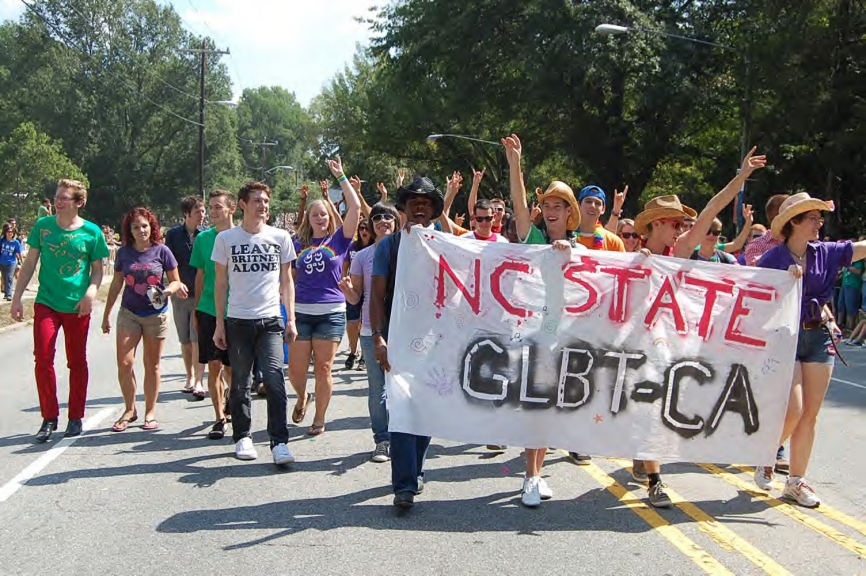Members of NC State's Gay, Lesbian, Bisexual, Transgender Community Alliance (GLBTCA) at the North Carolina Pride Parade and Festival, Durham, NC, 25 September 2010. 
