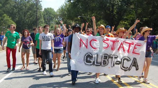 Members of NC State's Gay, Lesbian, Bisexual, Transgender Community Alliance (GLBTCA) at the North Carolina Pride Parade and Festival, Durham, NC, 25 September 2010. 