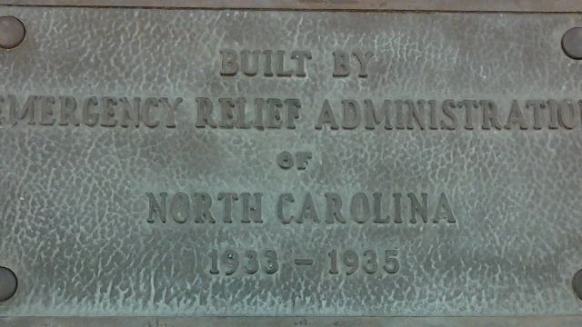 Plaque from NC State's Riddick Stadium (now demolished).  The stadium was at the site now occupied by SAS Hall and the adjacent parking lot.  The stadium stands and field house were constructed with New Deal funding.  From UA 020, Oversize Box 115.