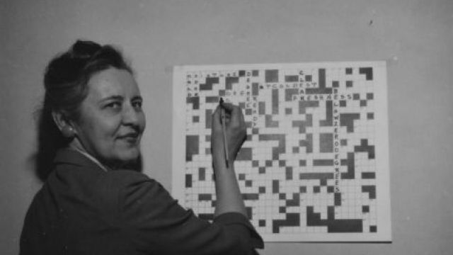 Extension Agent Nita Orr with a Frozen Food Crossword Puzzle