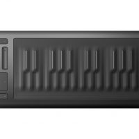 Piano keyboard shaped Roli Seaboard Rise with continuous gel surface.