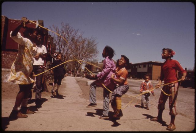 Black Children Play Double Dutch Outside The Ida B. Wells Homes