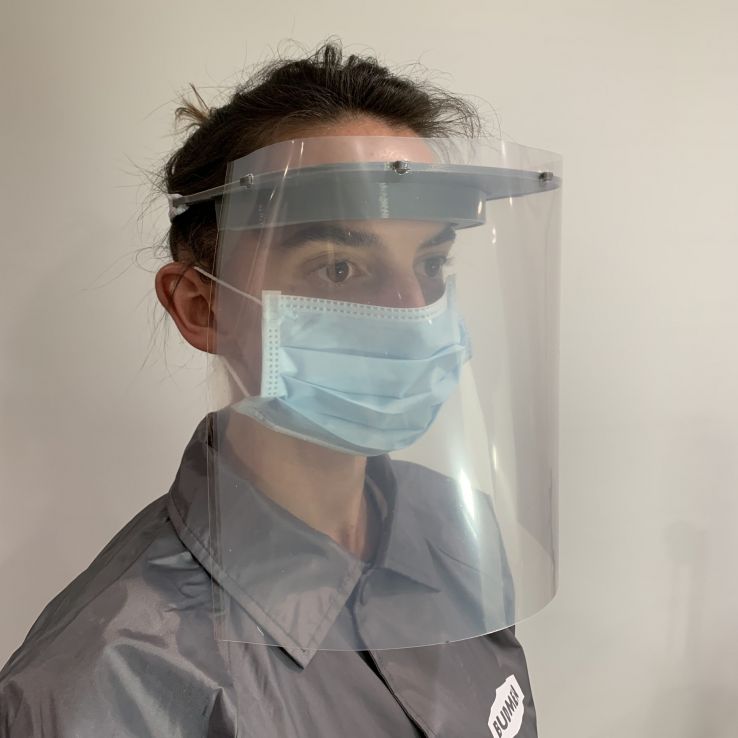 image of person wearing a clear face shield