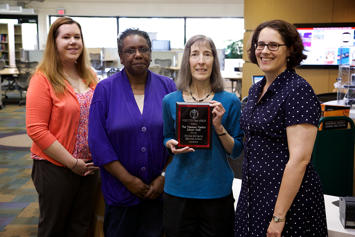 Kris Alpi and her team recognized with the Phyllis Edwards Service Award in 2013