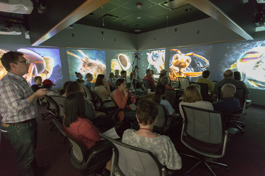 The new Visualization Studio featuring 360-degree projection and surround sound capabilities in a round, 29-foot-wide projection room updates the smaller older space.