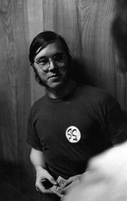 Gusler with an All Campus concert button or sticker on his shirt, 1972.