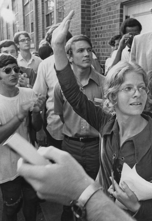 Cathy Sterling (right) and other students outside Nelson Hall, 13 May 1970.  Faculty had just approved procedures for students to attend the Peace Retreat instead of class.  