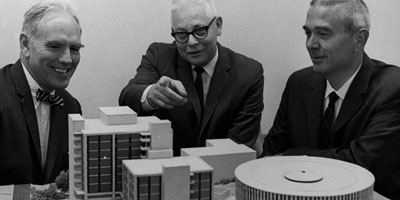 1961: Head of the Department of Chemistry, Ralph Clay Swann (center), and two others look at models of what are today Cox, Dabney and Harrelson Halls.